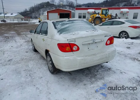 2003 Toyota Corolla Le z USA, uszkodzony, nr VIN JTDBR32E732015404